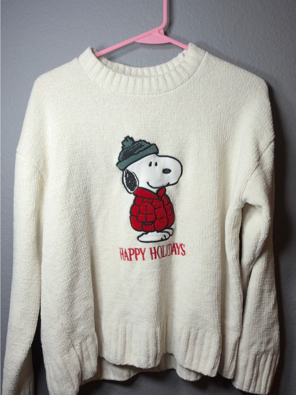 Peanuts Cream Crewneck Sweater with Snoopy in Red Jacket and Green Hat